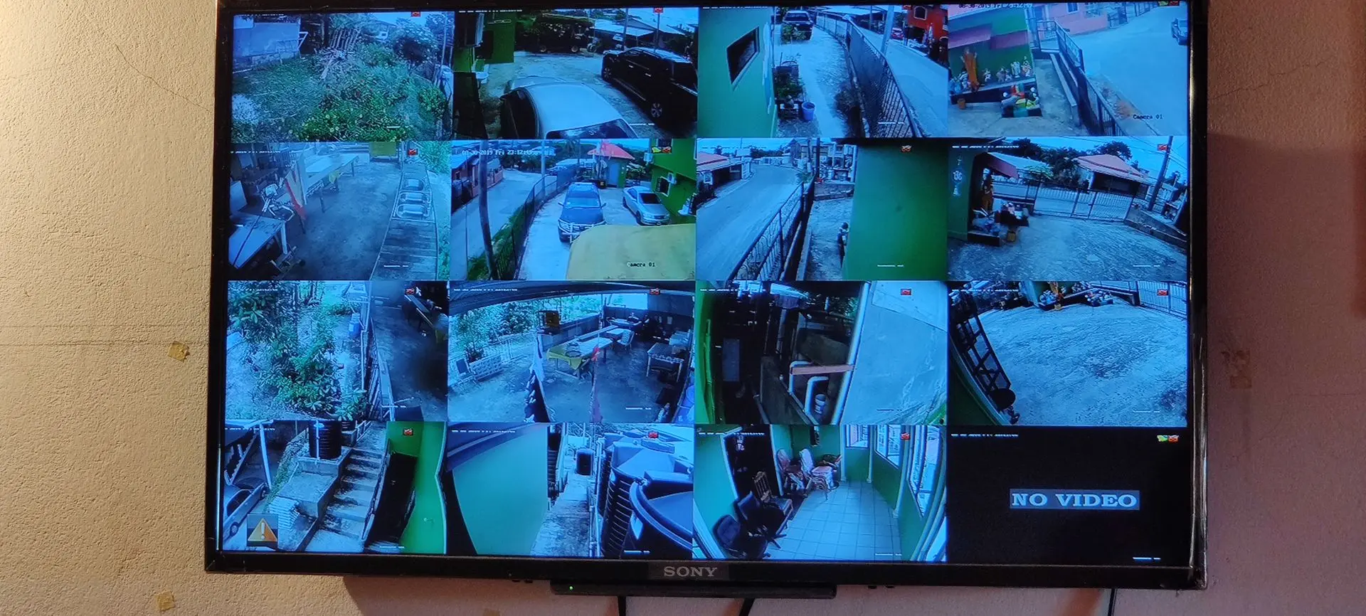 CCTV video wall showing multi-camera feeds in Penal Multi-channel CCTV monitoring screen displaying live security feeds in a business premises in Penal, Trinidad
